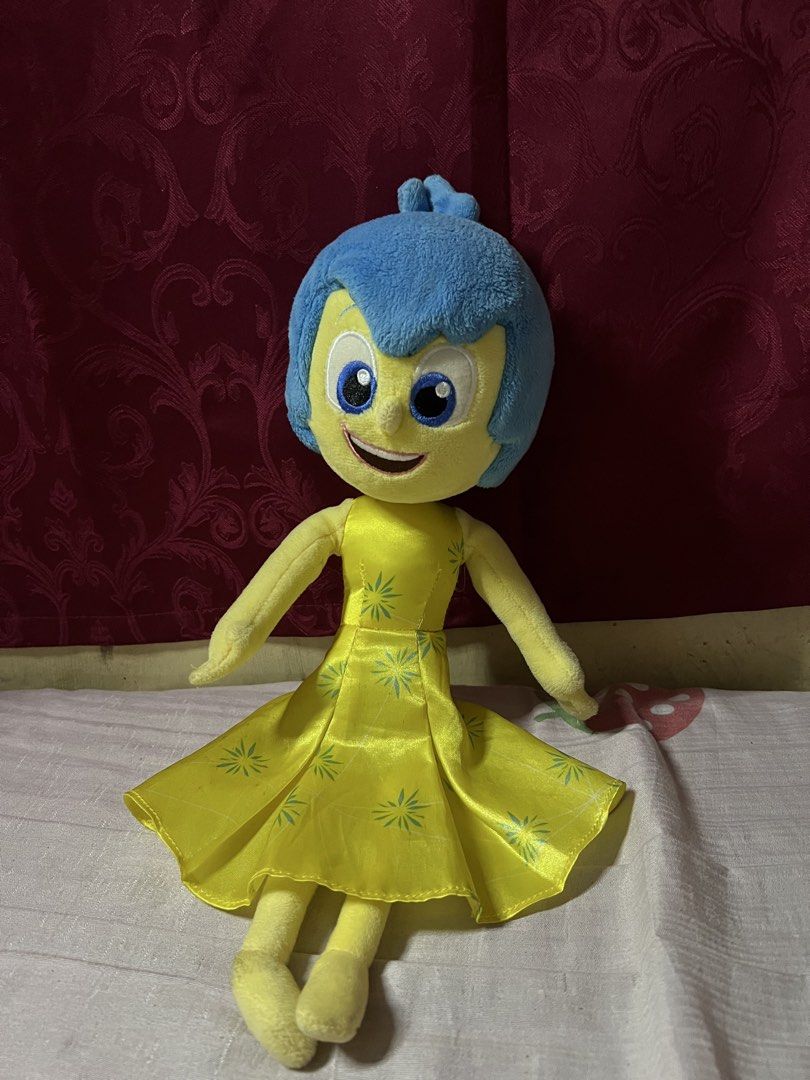 Disney Pixar Inside Out Joy Plush Toy (Category: Plushies & Soft Toys) located in Bulacan. Submitted by haven_plushie_dolls.888 (Listing ID 1464114314, Image 1). Description: - Authentic Disney Pixar Inside Out Joy plush toy. - Wearing her signature yellow dress with blue starbursts. - Dress features a convenient velcro closure at the back. - Soft and huggable, perfect for cuddles. - A must-have for any fan of the Inside Out movie..