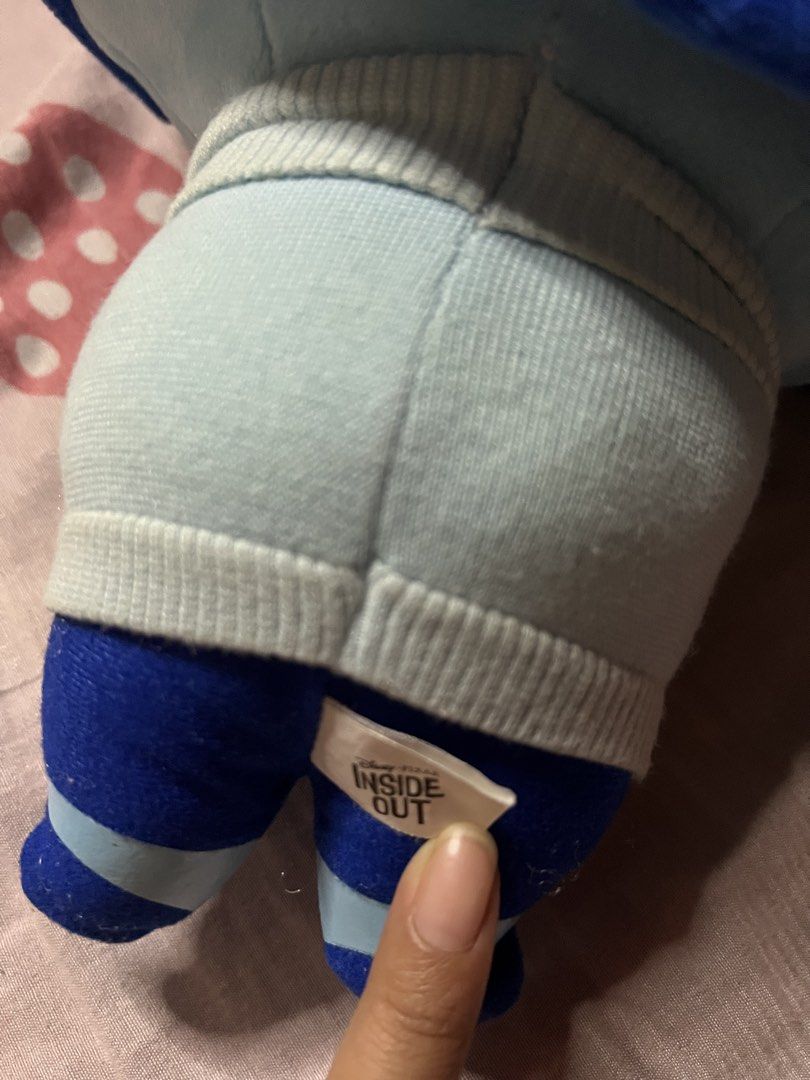Disney Pixar Inside Out Sadness Plush Toy (Category: Plushies & Soft Toys) located in Bulacan. Submitted by haven_plushie_dolls.888 (Listing ID 1464114391, Image 3). Description: - Sadness plush toy from Disney Pixar's Inside Out - Features blue hair, glasses, and sweater - Soft and huggable material - Approximately 10-12 inches tall - Perfect for fans of the movie - Clean and well-kept condition.