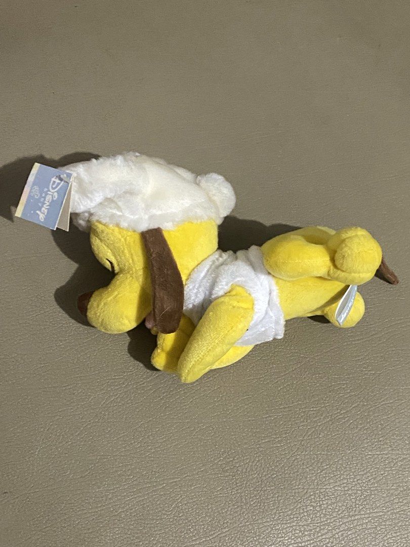 Disney Pluto Plush Toy with Chef Hat (Category: Plushies & Soft Toys) located in Davao. Submitted by hoowans_surplus (Listing ID 1464067695, Image 2). Description: - Adorable Pluto plush toy - Features a cute chef hat - Classic yellow and white colors - Perfect for Disney fans and collectors - Soft and cuddly material - Ideal for display or play.