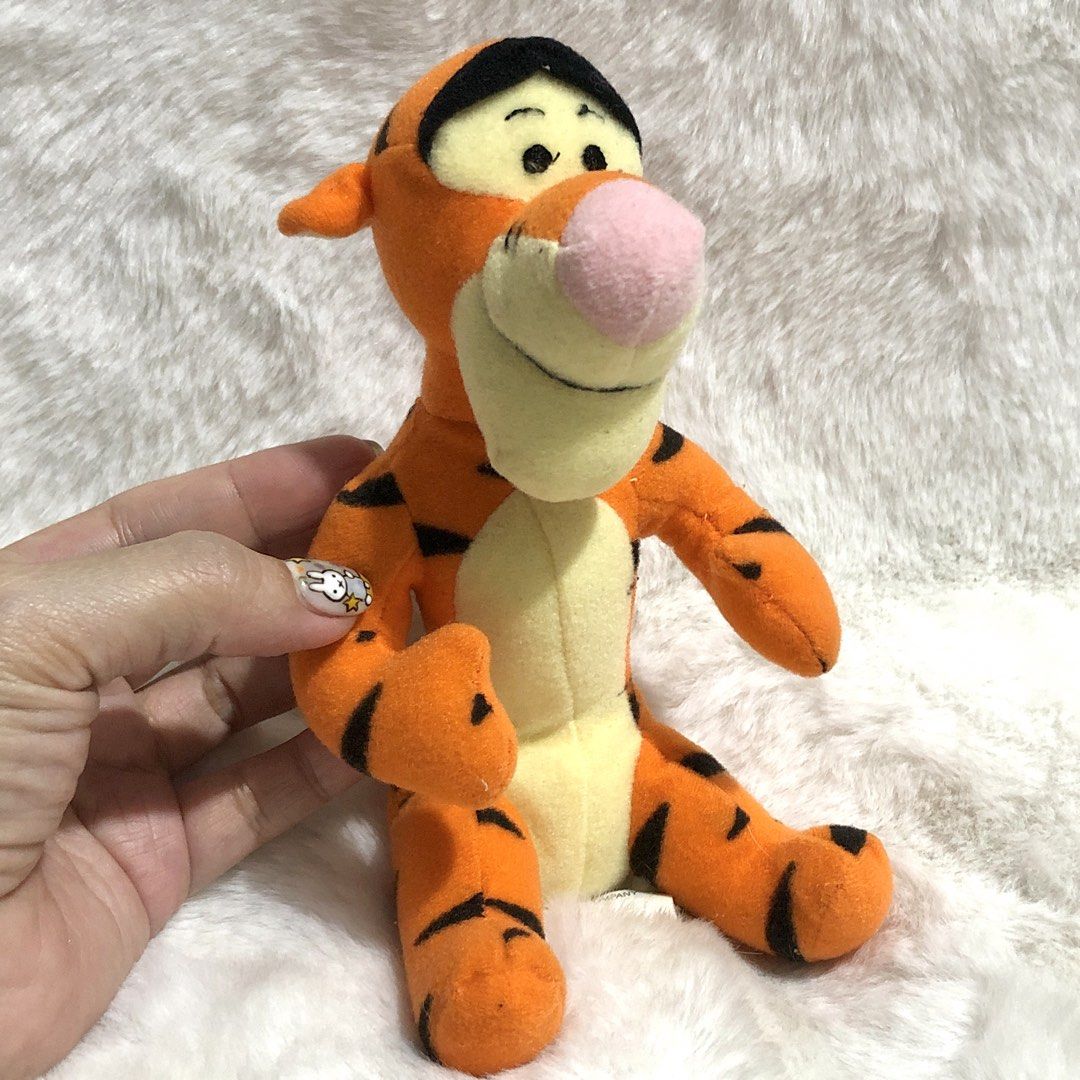 Disney Winnie the Pooh Tigger Plushie (Category: Infant Playtime) located in Quezon City. Submitted by kitsune.treasures (Listing ID 1464093667, Image 1). Description: *First to pay policy! *1 day reservation only. Failure to pay on time, auto cancel. 📍Quezon City * MOD: J&T | Lalamove * MOP: GCASH | BPI 📦ON HAND AND READY TO SHIP! CONDITION: WHAT YOU SEE IS WHAT YOU GET. Dimensions: Kindly check the photos for the actual measurements. Please c