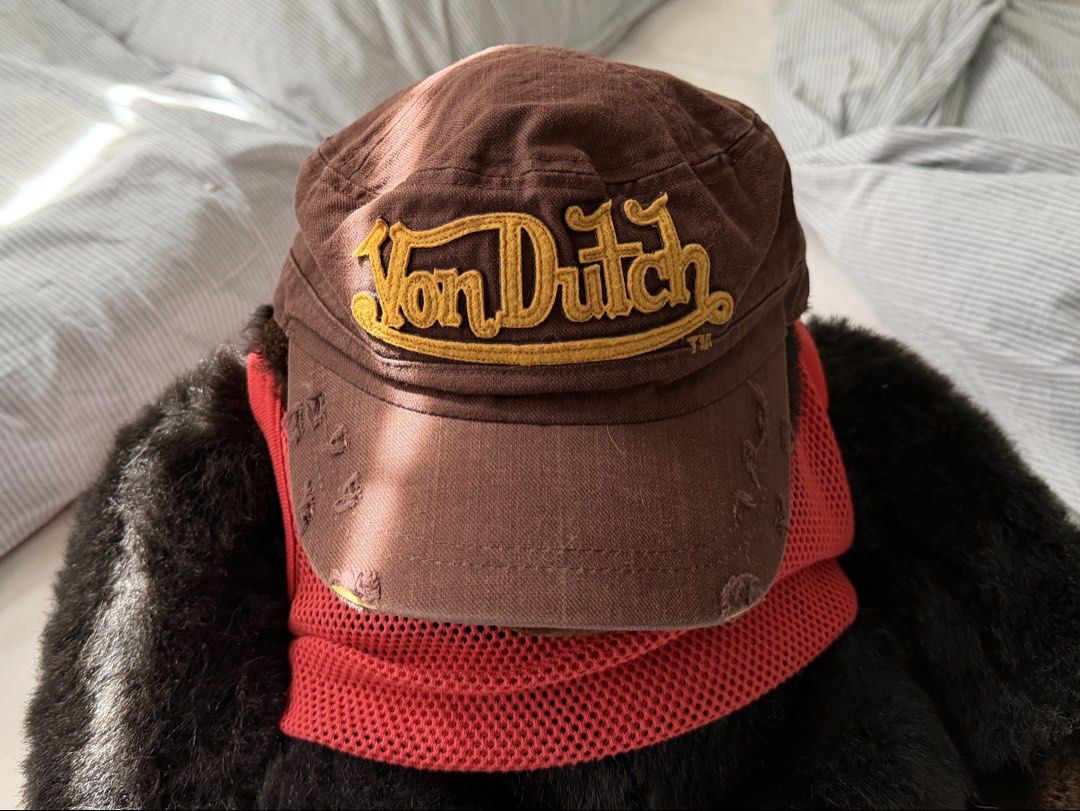 Distressed Von Dutch Cadet Cap (Category: Caps & Hats) located in Manila. Submitted by yzzaes (Listing ID 1463944253, Image 1). Description: - Limited edition brown Von Dutch cap - Features embroidered Von Dutch logo on the front - Distressed details on the brim - Made in Korea.