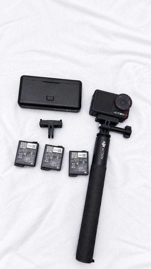 DJI Action 5 Pro Combo Set with Accessories (Category: Video Cameras) located in Manila. Submitted by mpradofyou (Listing ID 1464040092, Image 1). Description: - DJI Action 5 pro in Black - Includes camera and front touchscreen module - Magnetic mounting options for easy attachment - Comes with extra batteries and charging case - Grip extender included - Perfect for capturing all your adventures.