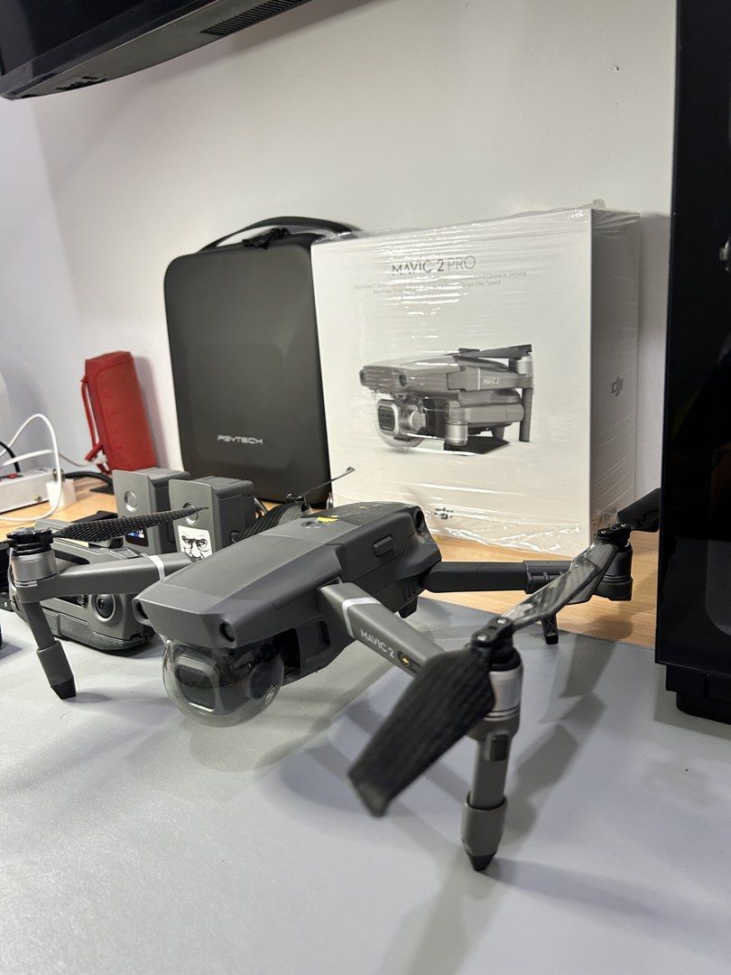 DJI Mavic 2 Pro Drone with Accessories (Category: Drones) located in Angeles City. Submitted by edelle18 (Listing ID 1464131490, Image 3). Description: - DJI Mavic 2 Pro Drone FMC - Includes Controller - Two (3) Intelligent Flight Batteries - PGYTECH Carrying Case - Original Packaging - Ideal for professional aerial photography and videography - Ready for your next adventure!.