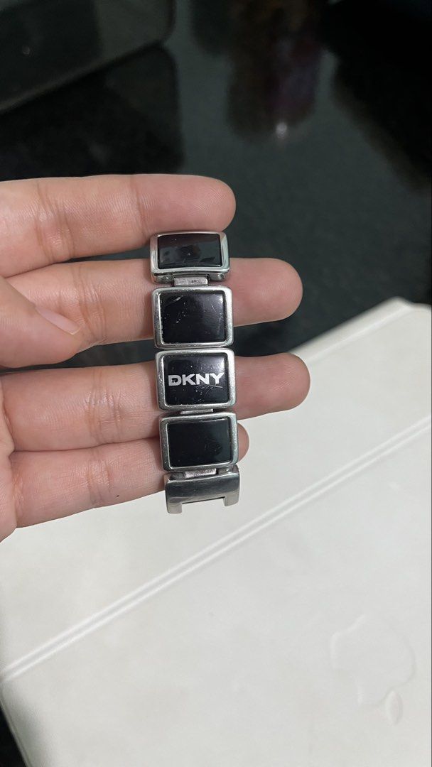 DKNY Y2K silver-tone bracelet watch (Category: Women's Watches) located in Lucena. Submitted by needfundsforojt (Listing ID 1463944357, Image 3). Description: (Personal Preloved) DKNY distinctive rectangular black links and a minimalist square black dial. - bought as is - some visible scratches - need battery replacement FREE DELIVERY 📦 NO COD! PAYMENT FIRST ☺️ MOP: Gcash/Landbank/Gotyme Bank.