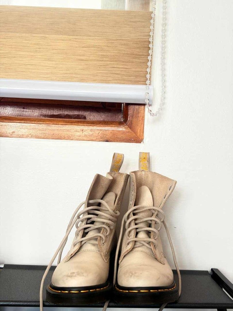 Dr. Martens 1460 Cream Leather Boots (Category: Boots) located in Mandaluyong City. Submitted by mommytinderella (Listing ID 1463953039, Image 3). Description: - Cream white Dr. Martens boots - Classic 8-eyelet lace-up style - Made in Vietnam - Minor scuffs and marks on leather - Yellow heel loops intact - Pre-loved and ready for a new owner RFS: outgrown fast due to growth spurt. .