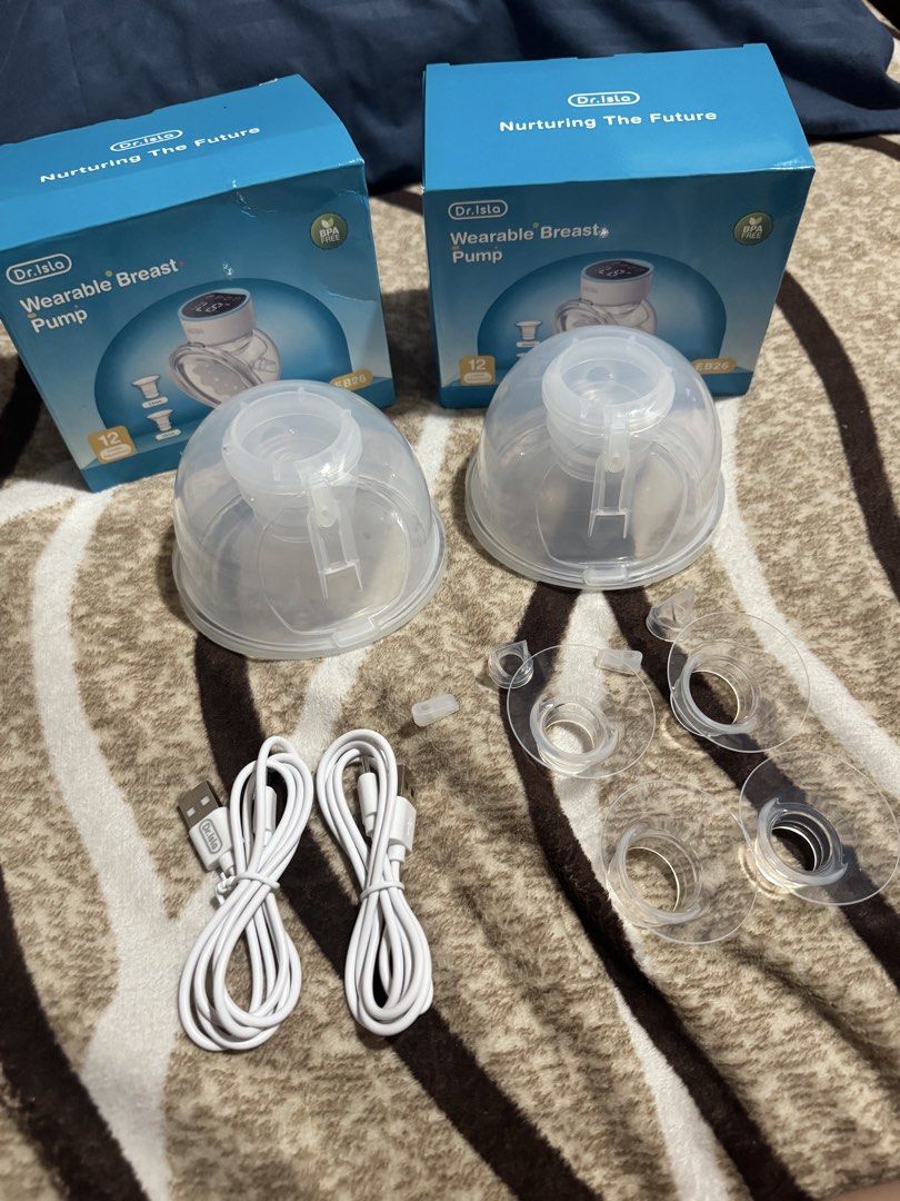 dr.isla EB26 Wearable Breast Pump Nurturing The Future - CUPS ONLY (Category: Breastfeeding & Bottle Feeding) located in Manila. Submitted by dpmanicad105057 (Listing ID 1463984764, Image 1). Description: - Selling 2 Dr.Isle wearable breast pumps- CUPS ONLY - Comes with USB charging cables - Includes extra parts - Flange size: 27mm - Ideal for on-the-go pumping - Easy to use and clean Free flange 19 mm, 21mm & 24 mm RFS 1 week of used I accidenta