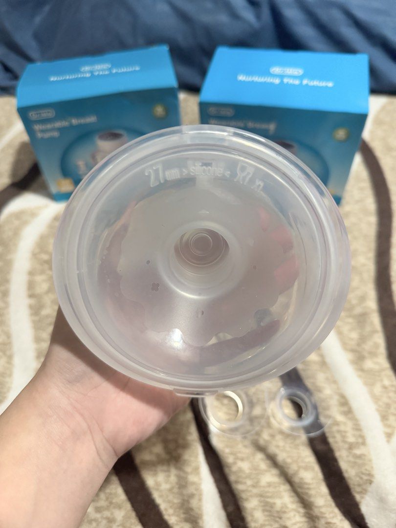 dr.isla EB26 Wearable Breast Pump Nurturing The Future - CUPS ONLY (Category: Breastfeeding & Bottle Feeding) located in Manila. Submitted by dpmanicad105057 (Listing ID 1463984764, Image 2). Description: - Selling 2 Dr.Isle wearable breast pumps- CUPS ONLY - Comes with USB charging cables - Includes extra parts - Flange size: 27mm - Ideal for on-the-go pumping - Easy to use and clean Free flange 19 mm, 21mm & 24 mm RFS 1 week of used I accidenta