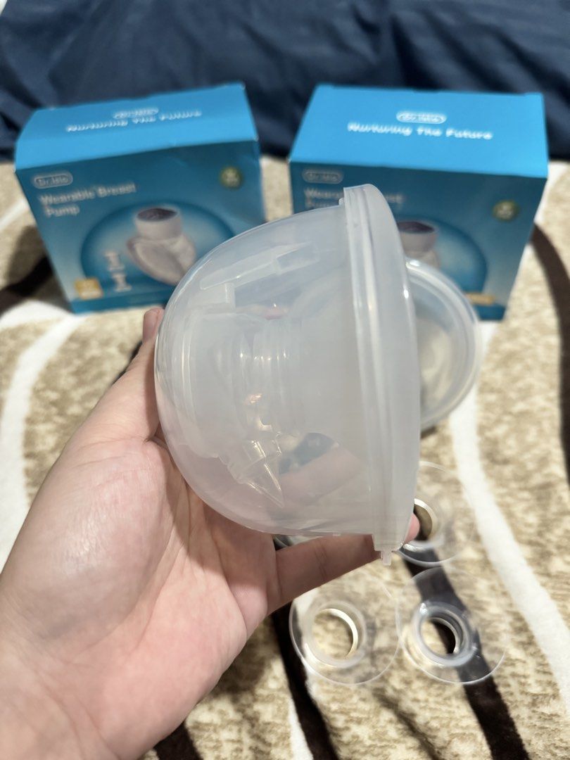 dr.isla EB26 Wearable Breast Pump Nurturing The Future - CUPS ONLY (Category: Breastfeeding & Bottle Feeding) located in Manila. Submitted by dpmanicad105057 (Listing ID 1463984764, Image 3). Description: - Selling 2 Dr.Isle wearable breast pumps- CUPS ONLY - Comes with USB charging cables - Includes extra parts - Flange size: 27mm - Ideal for on-the-go pumping - Easy to use and clean Free flange 19 mm, 21mm & 24 mm RFS 1 week of used I accidenta