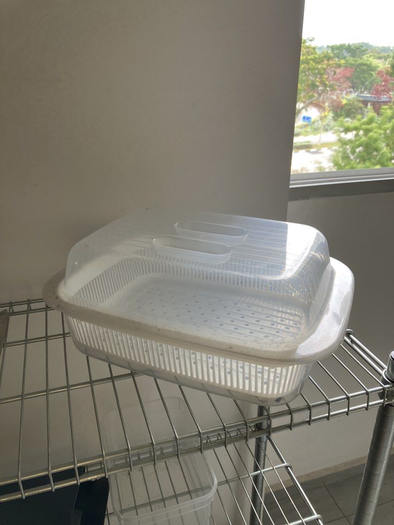Drying Rack (Category: Food Organisation & Storage) located in Singapore. Submitted by sleepy (Listing ID 1463984285, Image 2). Description: Plastic multilayered drying rack Dusty but barely used Self collect by 30 Sept near Siglap No delivery .