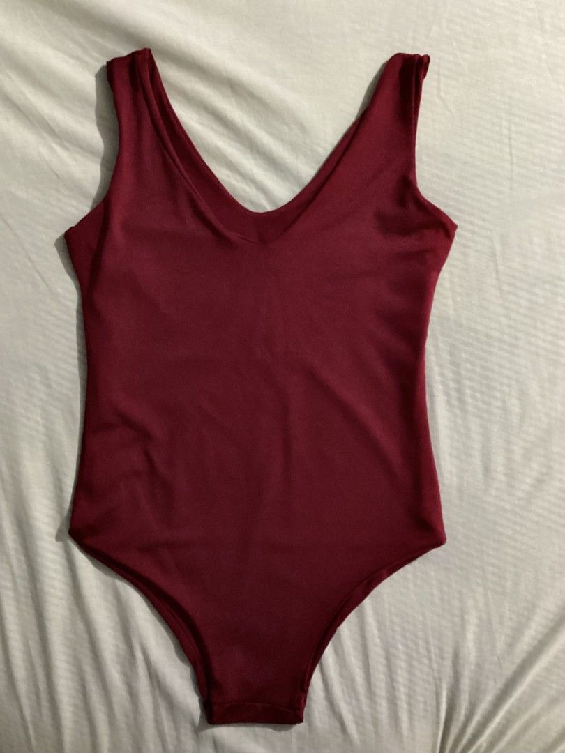 Dual Purpose Red V-Neck Top (Bikini or Top) (Category: Sleeveless) located in Rodriguez. Submitted by collectivebyj (Listing ID 1464005604, Image 3). Description: • Color: Red • Size: Small (S) • Can be worn as a bikini top or a regular top • Never been used • Good as new.