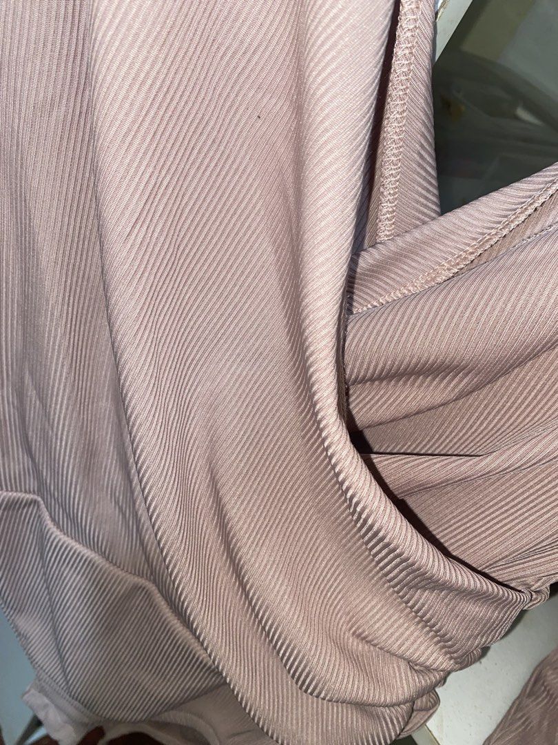 Dusty Pink Long Sleeve Wrap Bodysuit (Category: Others Tops) located in Antipolo. Submitted by chamm_424 (Listing ID 1464113726, Image 3). Description: * Long sleeves (medium) * Wrap-style V-neck design * Fitted and flattering silhouette * Bodysuit style with bottom snap closure.