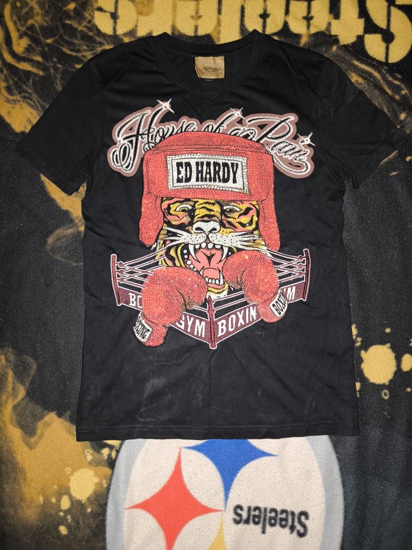 Ed Hardy Black Tiger Boxing Tee (Category: Tshirts & Polo Shirts ) located in Manila. Submitted by fljaoti27 (Listing ID 1463957191, Image 1). Description: Ed hardy Tee Small.