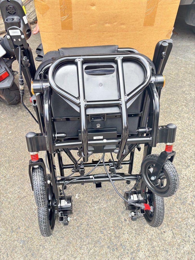 Electric Wheelchair with Joystick Controller (Category: Wheelchairs) located in Manila. Submitted by rosel2001 (Listing ID 1463994664, Image 3). Description: - Electric wheelchair for easy mobility - Intuitive joystick controller for effortless navigation - Comfortable black mesh seat with armrests and footrest - Durable black metal frame - Integrated battery compartment and motor at the back - Comes with charging cable and adapter - Ready for it