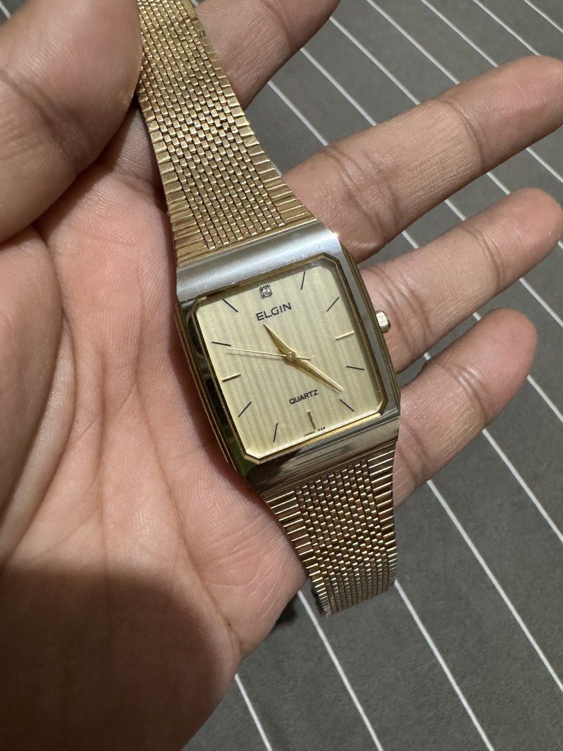 Elgin Quartz Watch Gold Tone Mesh Band (Category: Women's Watches) located in Iloilo. Submitted by segundo.ilonggo (Listing ID 1463972045, Image 1). Description: - Vintage Elgin quartz watch - Gold tone case and mesh bracelet - Rectangular face with champagne dial - Classic, versatile style - Requires a new battery - Sold as is.