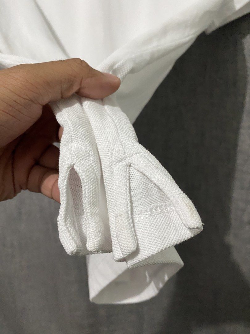Emperio Armani White Poloshirt (Category: Tshirts & Polo Shirts ) located in Davao. Submitted by thebigbadblob (Listing ID 1464091624, Image 3). Description: no issues cut washtag 21 x 29 xl on tag excellent condition .