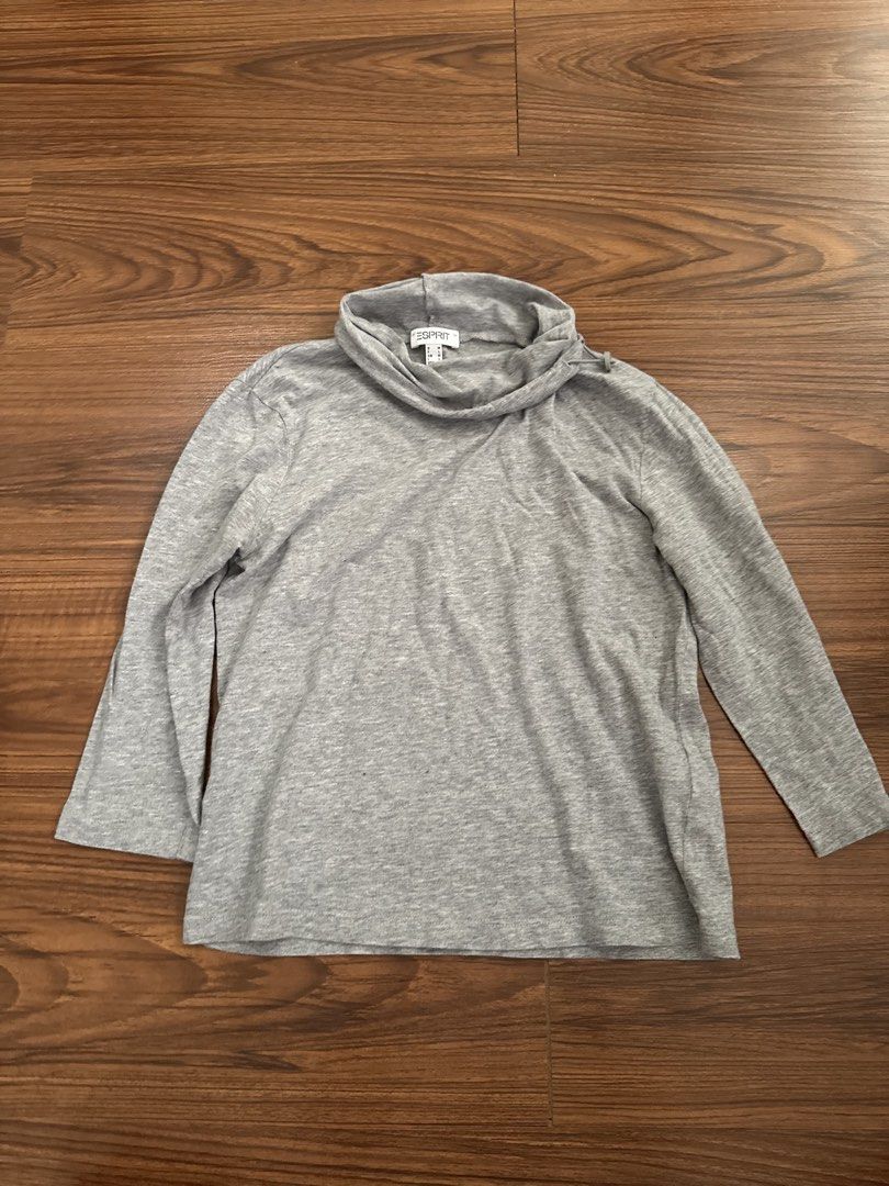 Esprit Grey Long Sleeve Turtleneck Top Size M (Category: Longsleeves) located in Rizal. Submitted by thrifty.mom (Listing ID 1463991545, Image 1). Description: - Brand: Esprit - Color: Grey - Style: Long sleeve turtleneck top - Material: Soft and comfortable - Versatility: Great for layering or wearing on its own - Occasion: Suitable for casual or slightly dressier events - Measurements: Approximately 18 inches across the chest, 21 inches in leng