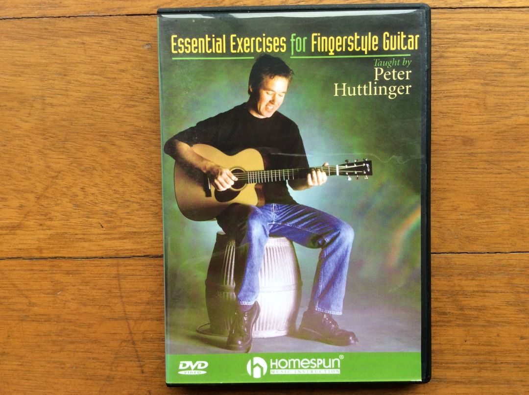 Essential Exercises for Fingerstyle Guitar DVD by Peter Huttlinger (Category: CDs & DVDs) located in Silang. Submitted by lawrencenorthey (Listing ID 1463951264, Image 1). Description: - Master fingerstyle guitar with Peter Huttlinger's expert DVD. - Features 60 minutes of music and accompanying tab files. - Includes viewable/printable instructions. - Perfect for guitarists of all skill levels. - Build a strong foundation for your guitar playing.