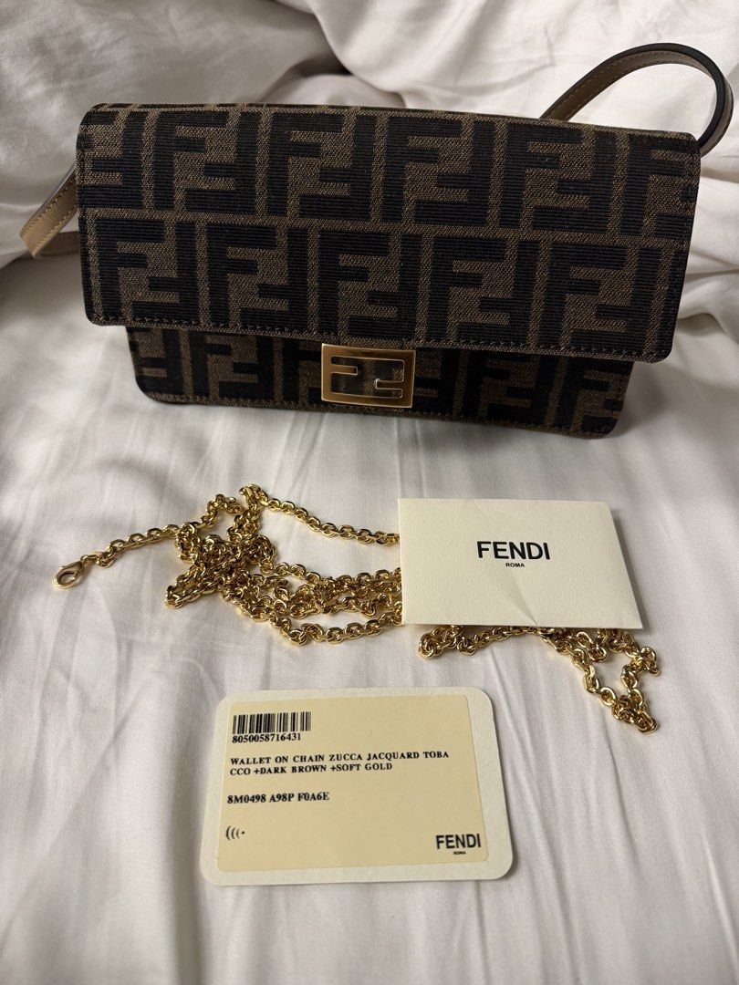 Fendi Zucca Jacquard Wallet on Chain Bag (Category: Luxury Bags & Wallets) located in Makati City. Submitted by arkera.274 (Listing ID 1464051996, Image 3). Description: Fendi wallet on chain in Zucca jacquard. Dark brown with soft gold hardware. Includes dust bag, box, and authenticity cards. Chain strap is detachable. Great for essentials..
