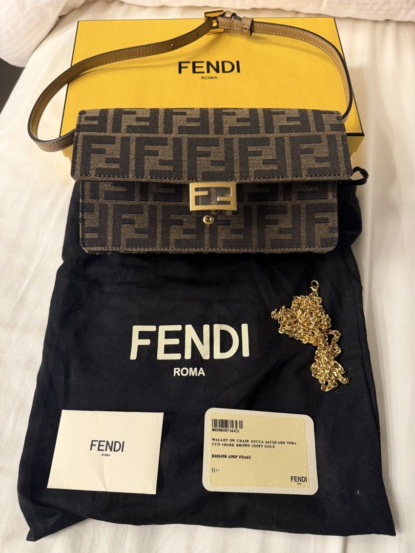 Fendi Zucca Jacquard Wallet on Chain Bag (Category: Luxury Bags & Wallets) located in Makati City. Submitted by arkera.274 (Listing ID 1464051996, Image 1). Description: Fendi wallet on chain in Zucca jacquard. Dark brown with soft gold hardware. Includes dust bag, box, and authenticity cards. Chain strap is detachable. Great for essentials..