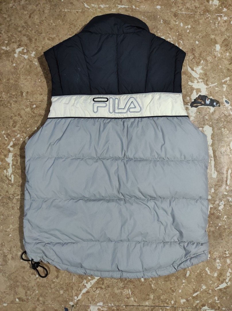 FILA PUFFER SLEEVELESS JACKET (Category: Coats, Jackets and Outerwear) located in Las Pinas. Submitted by jeusmanlangit (Listing ID 1464074199, Image 2). Description: FILA PUFFER SLEEVELESS JACKET DIMES: W: 21. L: 26 NO ISSUE 700 pesos lang DM📩.