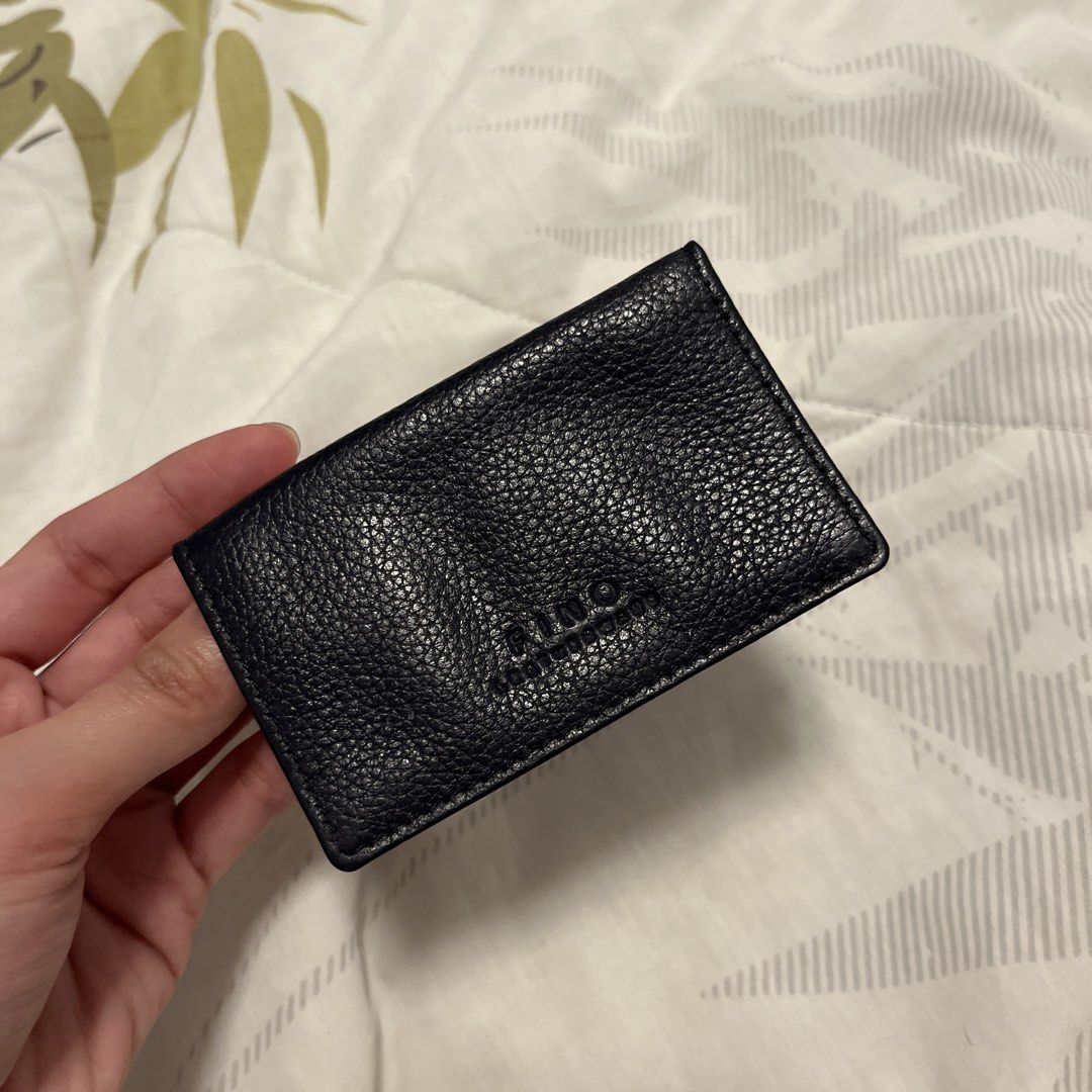 FINO Navy Blue Leather Card Holder (Category: Wallets & Card holders) located in Las Pinas. Submitted by thevallerys (Listing ID 1464043815, Image 1). Description: - Genuine navy blue pebbled leather card holder - Blue lining inside - 2 Clear card slots for visibility - Never used.
