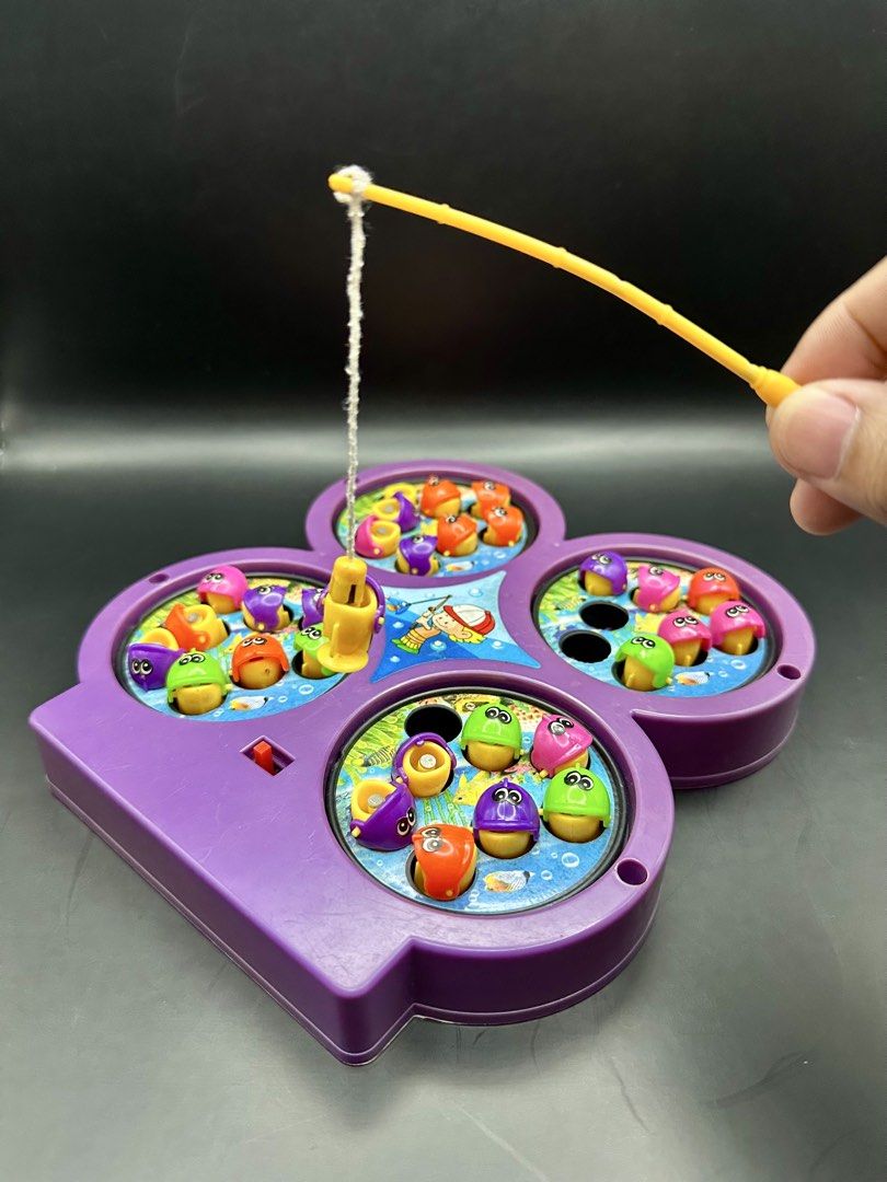 Fishing Game Toy for Kids (Category: Kids Toys) located in Batangas. Submitted by batang90s_ako (Listing ID 1463948432, Image 2). Description: Working turning mechanism Need 2x AA batteries As-is condition Only one magnetic fishing rod included WYSIWYG Issue: 3 fish missing 1 fish (no face).