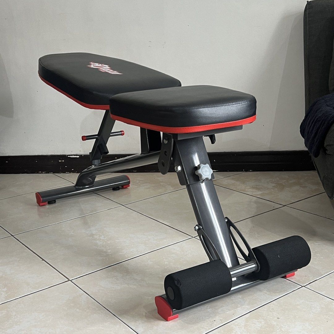 Foldable Home Gym Bench (Category: Weights & Dumbbells) located in Quezon City. Submitted by ulapaap (Listing ID 1463988783, Image 2). Description: Condition: 10/10, well-maintained, barely used - Adjustable weight bench perfect for home gyms. - Comfortable padded seat and backrest. - Padded leg rollers for added comfort. - Backrest adjusts to multiple angles for versatile workouts. - Sturdy and durable metal frame. RFS: Moving Location: Monument