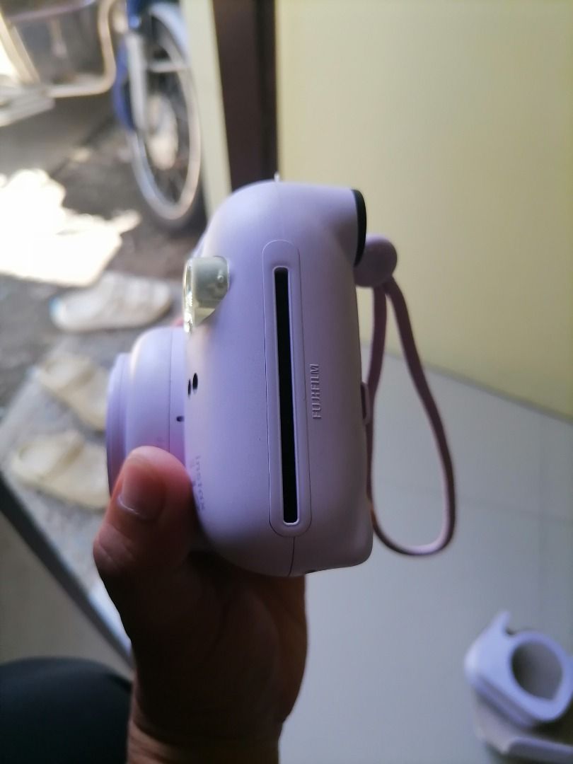 FOR SALE INSTAX MINI 12 LILAC (Category: Cameras) located in Caloocan City. Submitted by buymepls2019 (Listing ID 1464041963, Image 2). Description: FOR SALE INSTAX MINI 12 LILAC Inclusion: Instax Device Orig Battery Instax Cover Sling Bag 3,000 Only!!!.