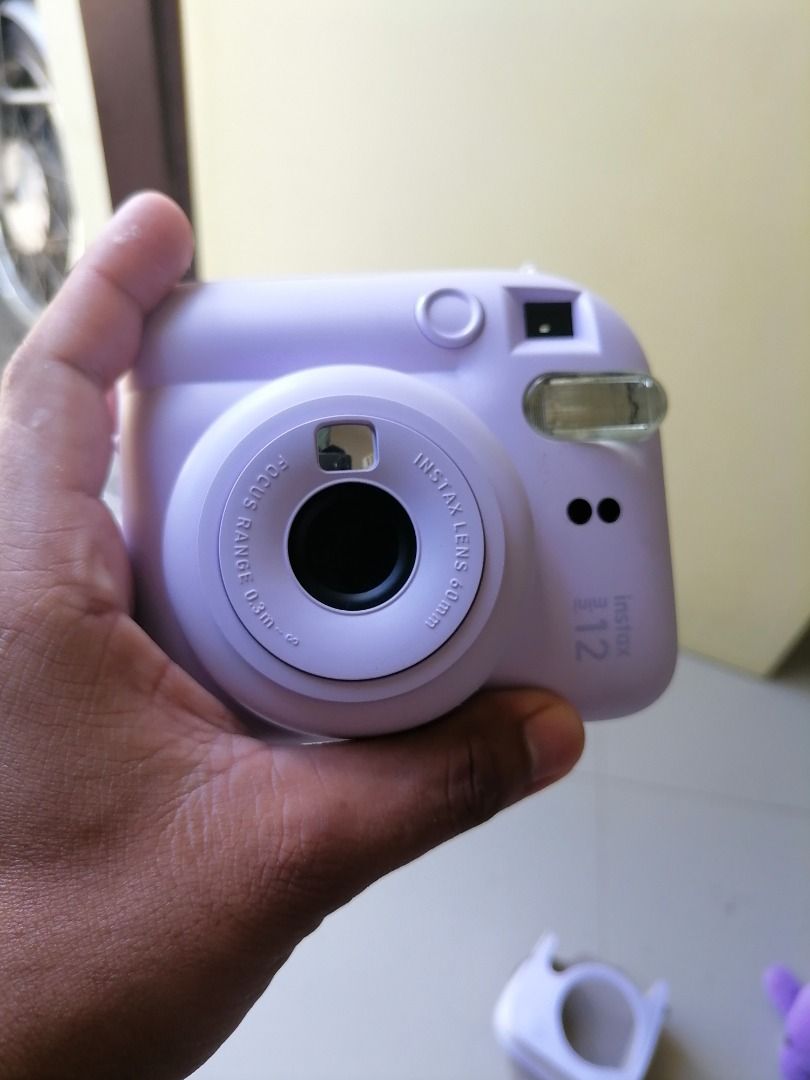FOR SALE INSTAX MINI 12 LILAC (Category: Cameras) located in Caloocan City. Submitted by buymepls2019 (Listing ID 1464041963, Image 3). Description: FOR SALE INSTAX MINI 12 LILAC Inclusion: Instax Device Orig Battery Instax Cover Sling Bag 3,000 Only!!!.