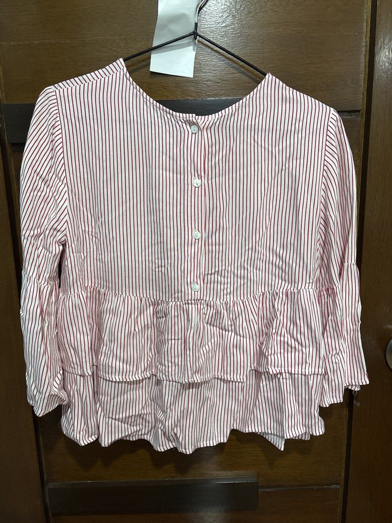 Forever 21 Striped Peplum Blouse (Category: Blouses) located in Mandaluyong City. Submitted by clothescarousel (Listing ID 1464096405, Image 3). Description: - Forever 21 white and red striped blouse - Peplum style with tiered ruffles at the hem - Bell sleeves - Button closure at the back - Size S/P - Made in Vietnam.