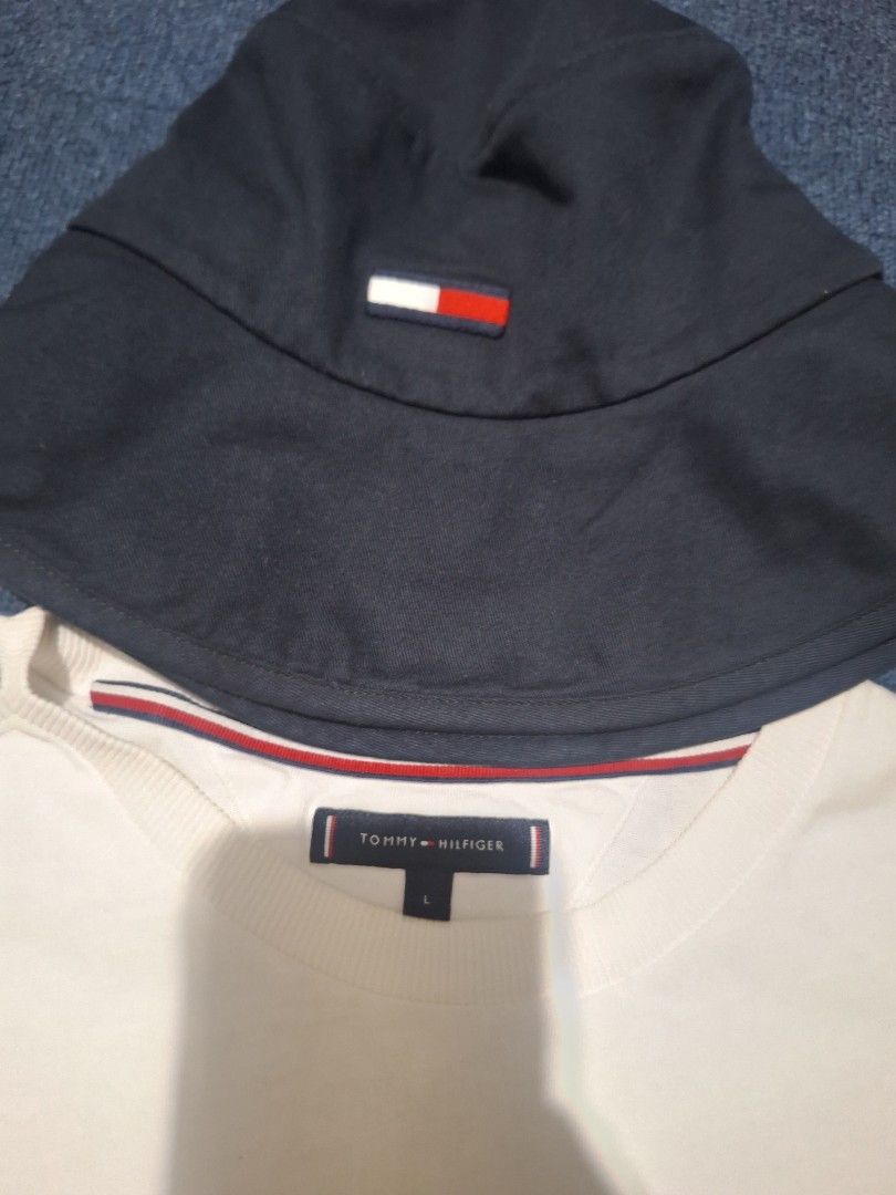 Forsale aspack size large .men (Category: Caps & Hats) located in Manila. Submitted by adolphreyes645 (Listing ID 1464068101, Image 2). Description: - Tommy Hilfiger White T-Shirt - Size: Large (L) - Material: 100% Organic Cotton - Features classic embroidered flag logo on front - Tommy Hilfiger Navy Bucket Hat - Includes small flag detail - Ideal for casual wear.