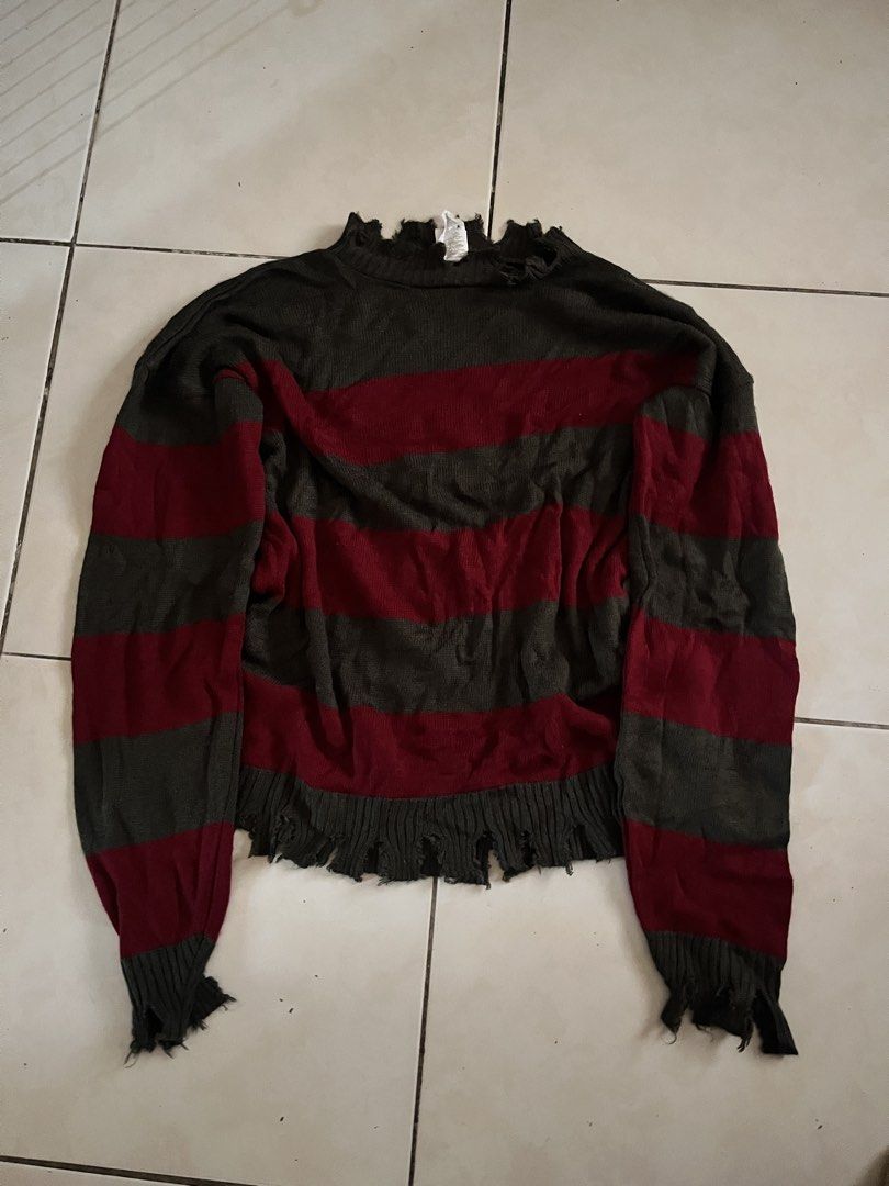 Freddy Krueger Sweater (Category: Coats, Jackets and Outerwear) located in Imus. Submitted by noojabez (Listing ID 1463970643, Image 1). Description: Collectible merch of Nightmare On Elm Street Color rate: 9/10 Condition 9/10 Dimes: 26L x 24 W NEEDS WASH y2k, grunge, freddy krueger, .