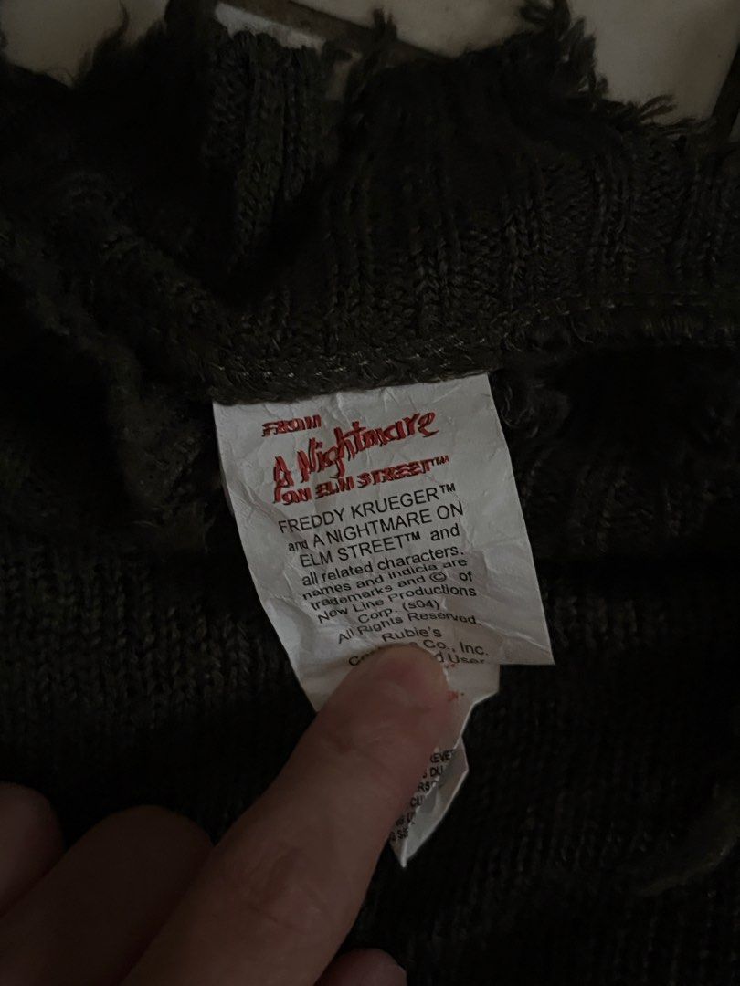 Freddy Krueger Sweater (Category: Coats, Jackets and Outerwear) located in Imus. Submitted by noojabez (Listing ID 1463970643, Image 2). Description: Collectible merch of Nightmare On Elm Street Color rate: 9/10 Condition 9/10 Dimes: 26L x 24 W NEEDS WASH y2k, grunge, freddy krueger, .