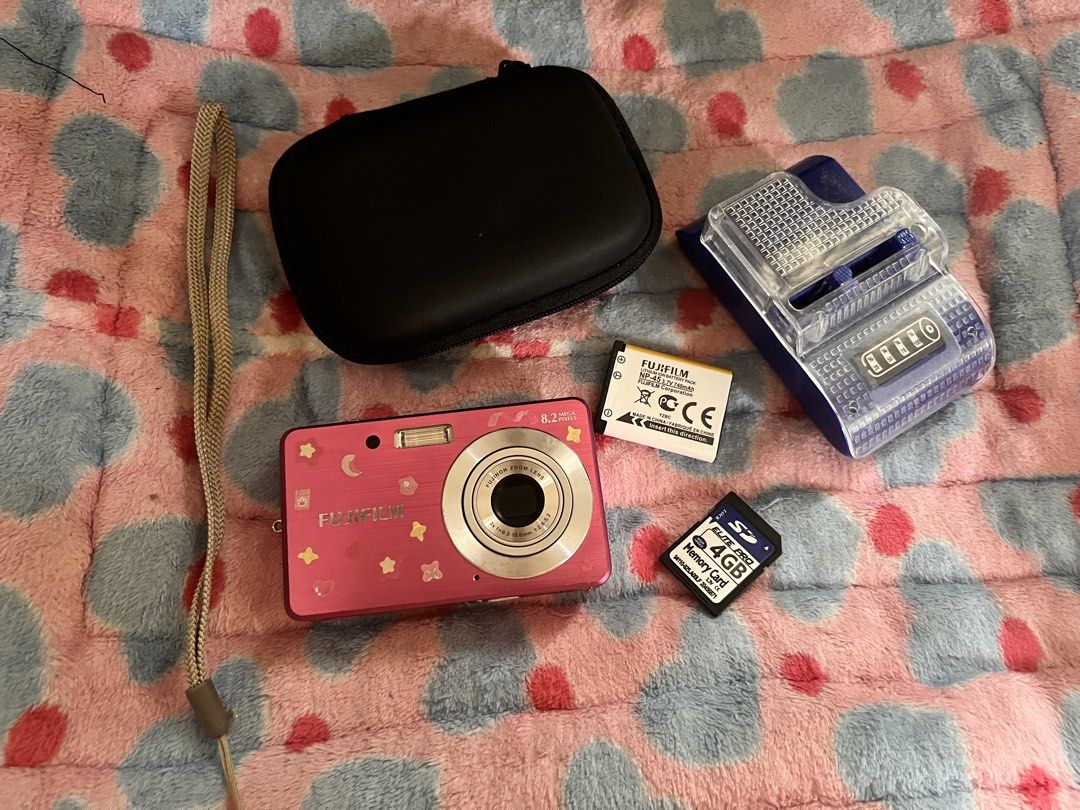 Fujifilm FinePix J12 8.2 MP Digital Camera (Category: Cameras) located in Norzagaray. Submitted by Rensirensie (Listing ID 1463977514, Image 3). Description: Fujifilm FinePix J12 8.2 MP Digital Camera CONDITION: Secondhand but fully working. BODY COSMETICS: 9/10 No issues built-in flash working scene modes 3x optical zoom 5.7x digital zoom 2.7” LCD display all buttons working approx. 24 MB internal memory uses SD / SDHC card INCLUSIONS: * Camera 