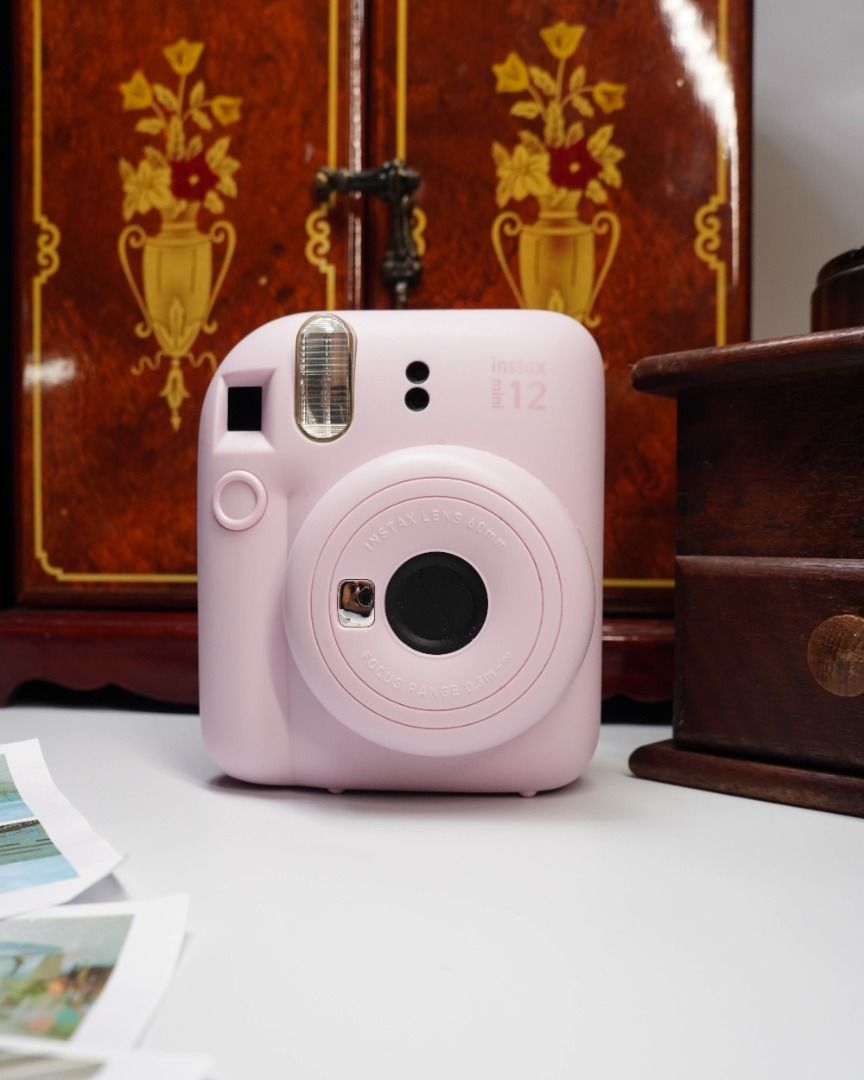 FUJIFILM INSTAX MINI 12 DISPLAY UNIT — ₱499 (Category: Cameras) located in Las Pinas. Submitted by retrocameraph (Listing ID 1464080927, Image 1). Description: 📸 FUJIFILM INSTAX MINI 12 DISPLAY UNIT — ₱499 It looks like an Instax Mini 12, feels like one in the hand, and even has that unmistakable Blossom Pink finish — but this one has a different purpose. 🌸 This is a rare Fujifilm display unit, made for display rather than taking photos. A fun 