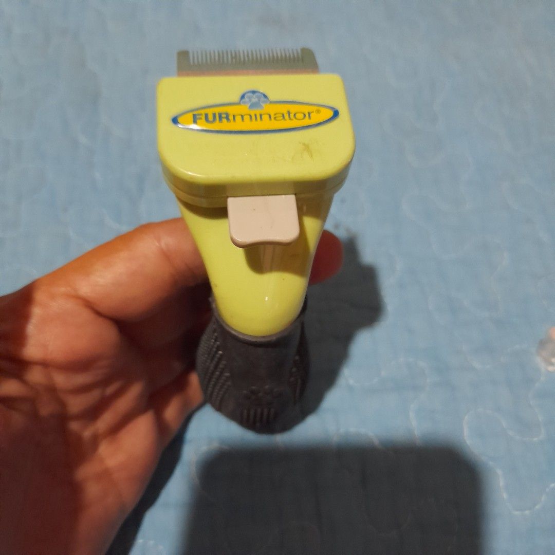 FURminator Deshedding Tool for Pets (Category: Health & Grooming) located in Bocaue. Submitted by marajapansurplus (Listing ID 1463984690, Image 2). Description: - FURminator deshedding tool - Effectively removes loose undercoat and excess hair - Features a comfortable grip handle for easy use - Promotes a healthy coat and significantly reduces shedding - Ideal for regular grooming sessions.