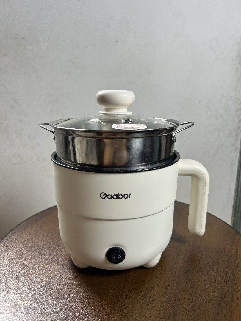 Gaabor Electric Pot (Category: Cookers) located in Quezon City. Submitted by guesswh0 (Listing ID 1463988154, Image 2). Description: Gaabor Electric Pot Used lang once Ginamit sa affiliate marketing.