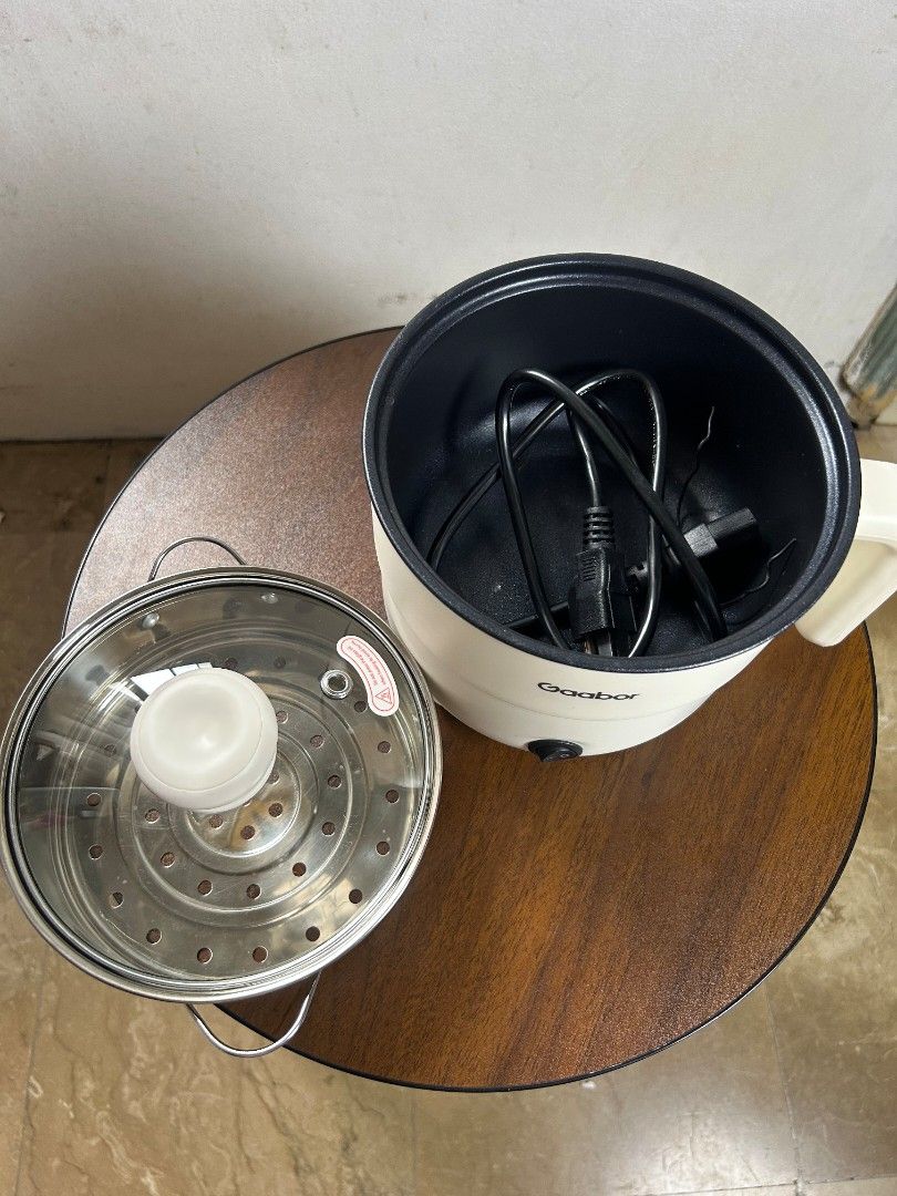 Gaabor Electric Pot (Category: Cookers) located in Quezon City. Submitted by guesswh0 (Listing ID 1463988154, Image 3). Description: Gaabor Electric Pot Used lang once Ginamit sa affiliate marketing.