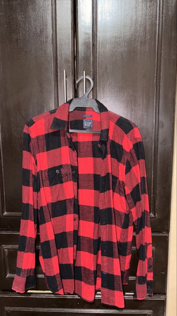 GAP Red Black Plaid Flannel Shirt (Category: Tshirts & Polo Shirts ) located in Manila. Submitted by keenfox-84bb (Listing ID 1464025055, Image 1). Description: - Classic red and black plaid flannel shirt - Brand: GAP - Fit: Standard - Features: Button-up front, two chest pockets, long sleeves with button cuffs - Versatile: Great for layering or wearing on its own - Style tip: Looks good with jeans.