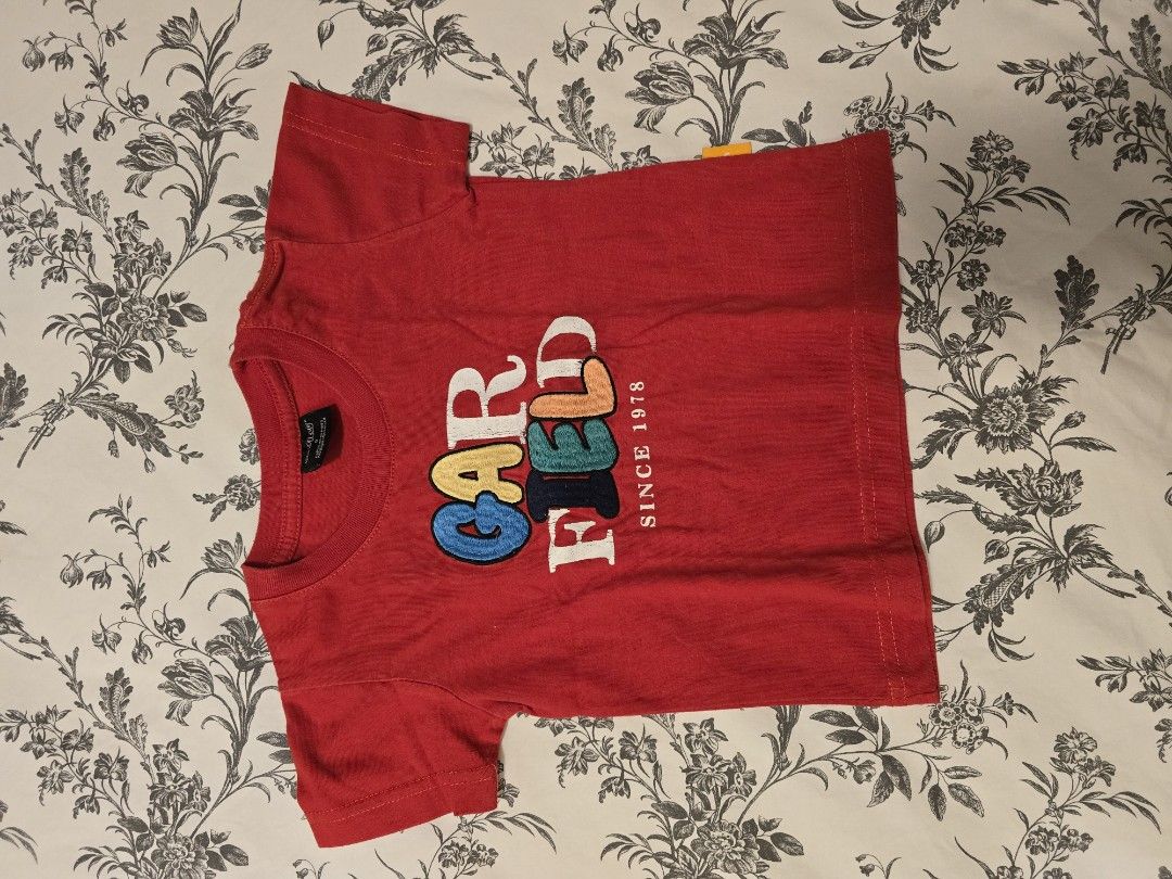 Garfield embroidered shirt (Category: Babies & Kids Fashion) located in San Juan City. Submitted by bianca_0 (Listing ID 1464054670, Image 1). Description: size 0 .