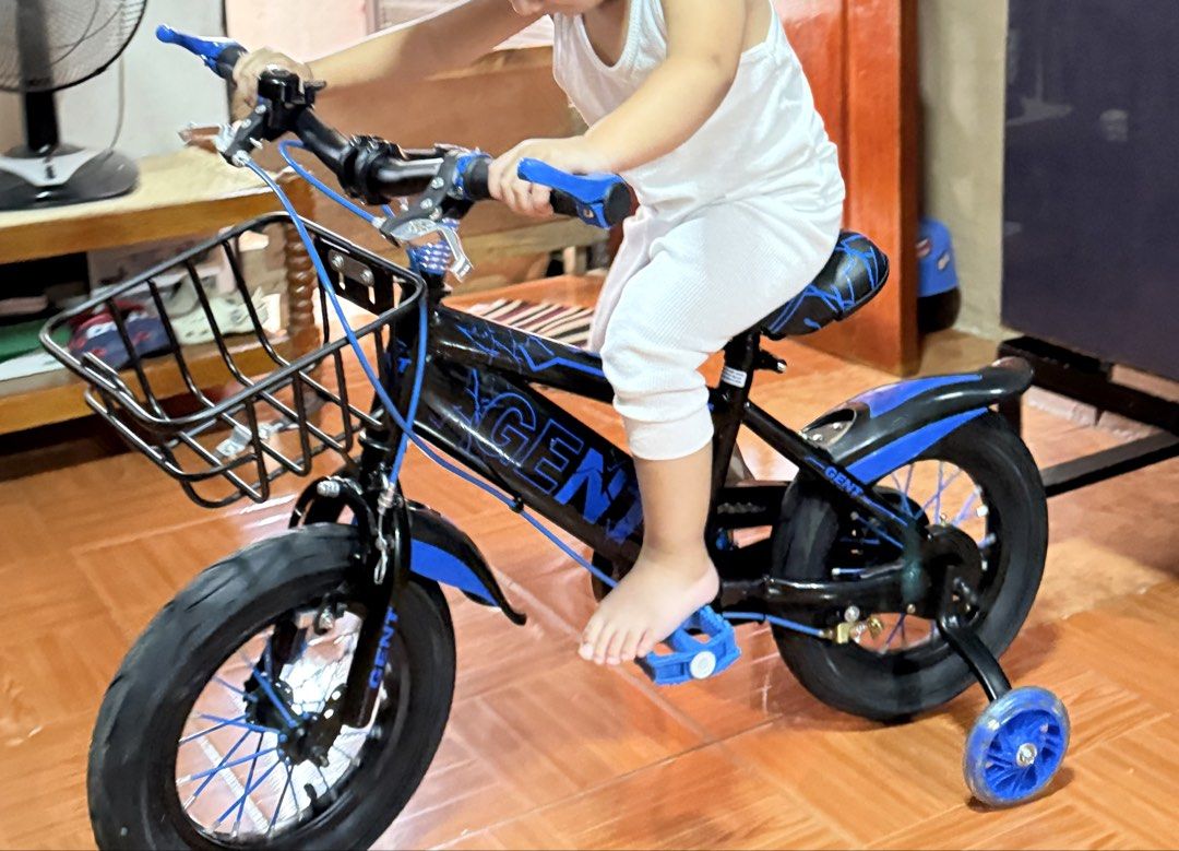 GENT Children's Bicycle with Training Wheels (Category: Bicycles) located in Manila. Submitted by kateintal (Listing ID 1464125063, Image 2). Description: - Black and blue GENT bicycle - Perfect for young riders - Comes with training wheels for easy learning - Features a front basket for convenience - Ready for exciting adventures!.