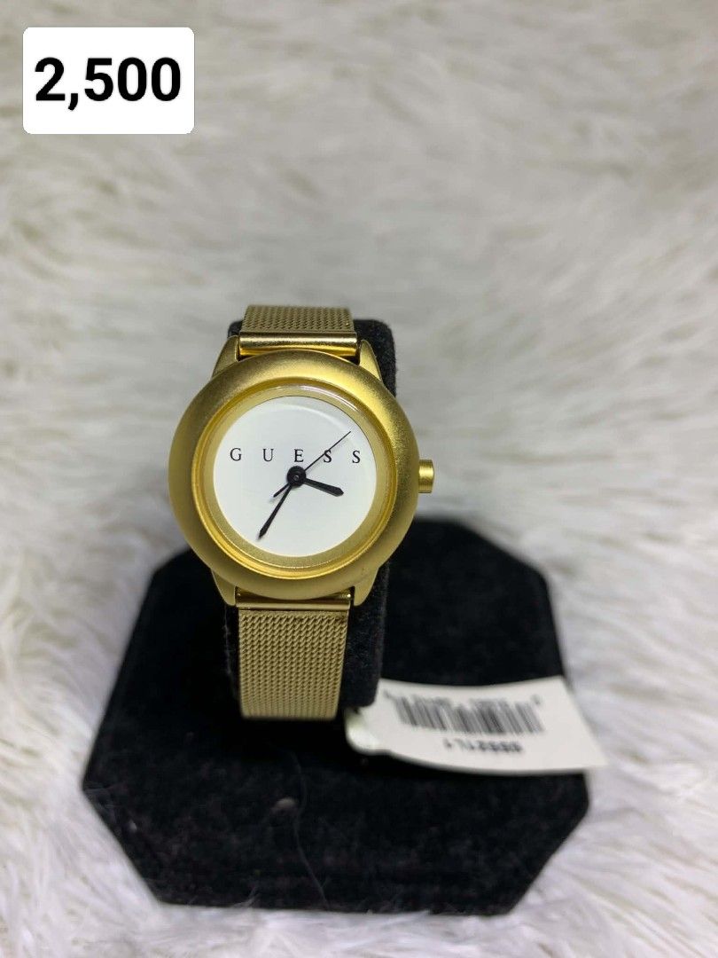 Gold Guess Watch (Category: Women's Watches) located in Manila. Submitted by jiainah (Listing ID 1463948614, Image 1). Description: - Authentic Gold Guess Watch - Elegant White Face - Stylish Mesh Strap - Perfect Accessory for Any Outfit - Selling Price: PHP 2,500.