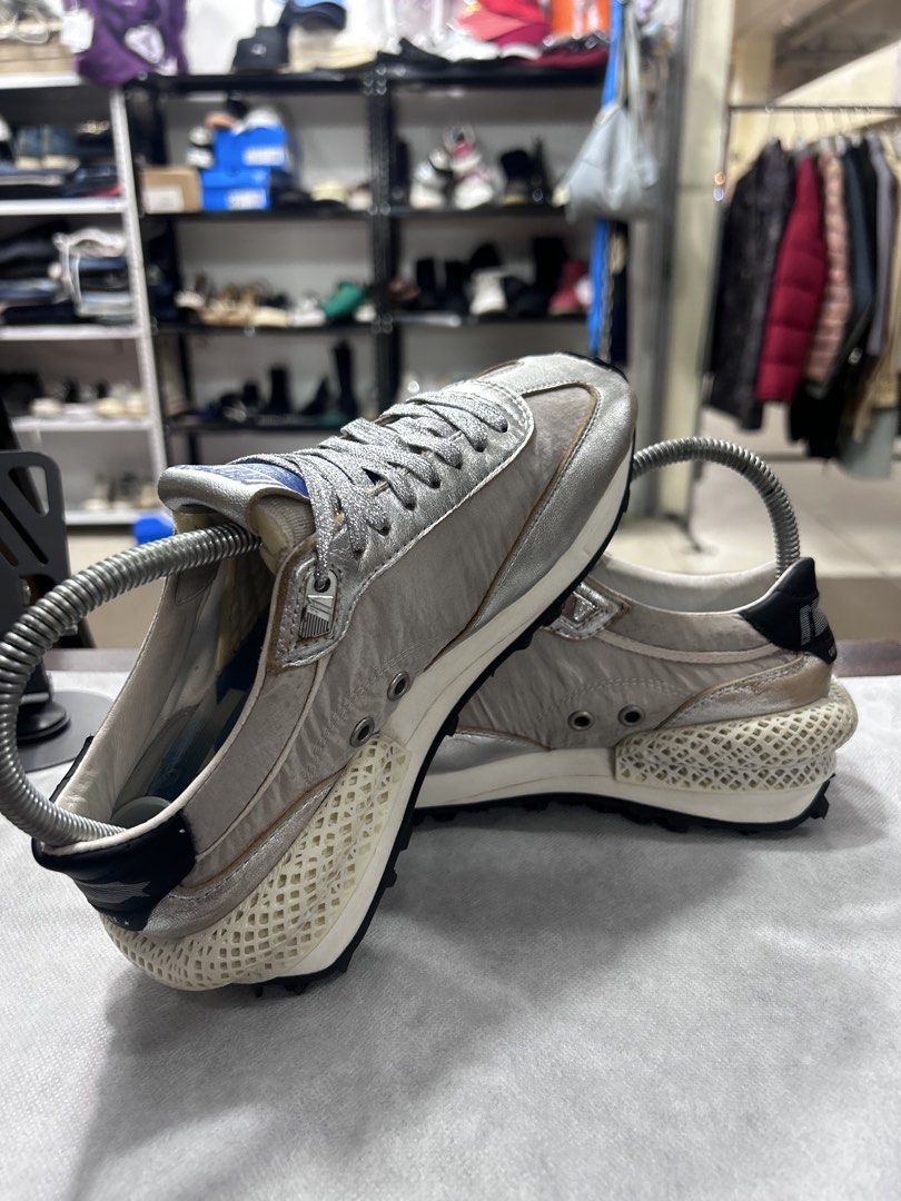 Golden Goose Marathoner Sneakers Silver (Category: Sneakers) located in Pasig City. Submitted by blitzkriegspc (Listing ID 1464136269, Image 3). Description: - Brand: Golden Goose - Model: Marathoner - Size: 40 - Color: Silver with black accents - Key Feature: Unique 3D printed sole - Style: Edgy, statement piece.