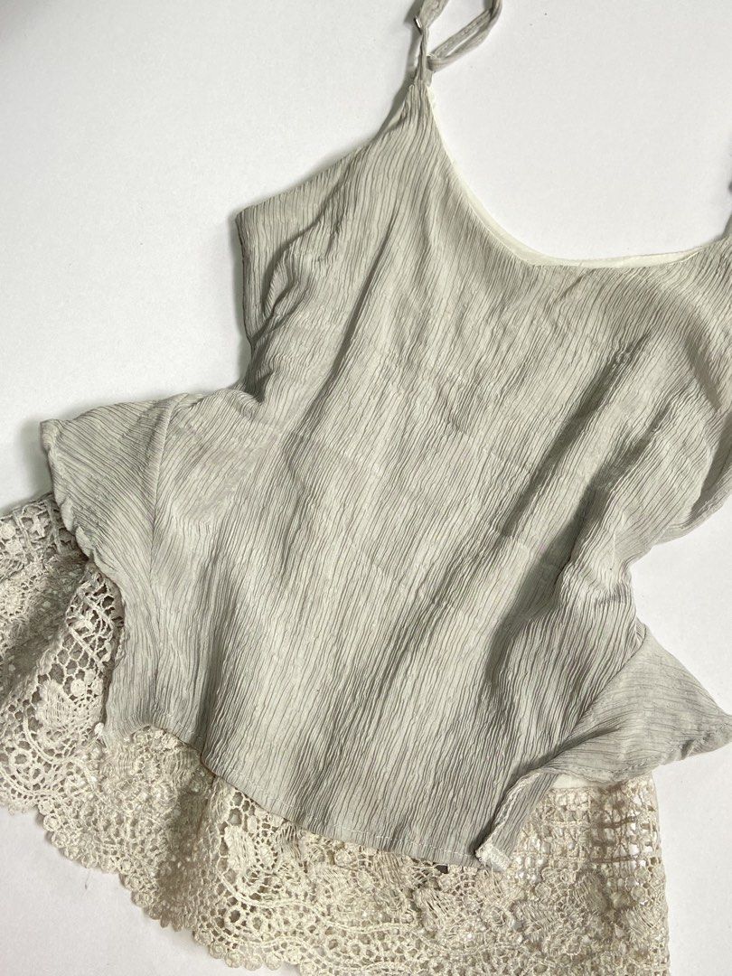 Gray Lacey Top (Category: Blouses) located in Manila. Submitted by carefreegarments3 (Listing ID 1463942567, Image 2). Description: ｡‧₊˚𖦹°‧🧚‍♀️₊˚✩ ‧ ୨୧ ‧₊˚ ⋅ ୨୧Lace Top✨ ♡XS-S —Very pretty, actually color is gray, excellent condition.