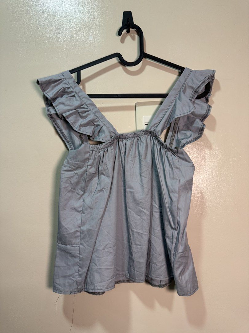 gray sleeveless top (Category: Blouses) located in Quezon City. Submitted by fashionifywardrobe8899 (Listing ID 1464098442, Image 2). Description: 2 pcs avail.