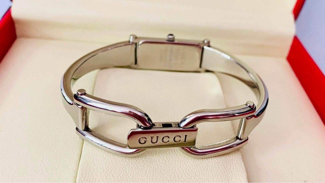 G.U.C.C.I Bangle 1500L Watch (Category: Women's Watches) located in Manila. Submitted by annafinds (Listing ID 1464065817, Image 2). Description: ₱13,500 Auth G.U.C.C.I Bangle 1500L Watch for Ladie’s -MOP Dial -Sapphire Glass -Swiss Made -Stainless Steel -Quartz Movement -For Medium Wrist Size -6.5” wrist -With Provided Box -In Excellent Condition 📌Disclaimer:📌 I Claim to be a Legit Watch Reseller. All Products, Names, Brands, and Logos are own