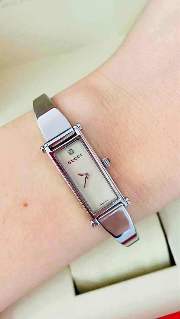 G.U.C.C.I Bangle 1500L Watch (Category: Women's Watches) located in Manila. Submitted by annafinds (Listing ID 1464065817, Image 3). Description: ₱13,500 Auth G.U.C.C.I Bangle 1500L Watch for Ladie’s -MOP Dial -Sapphire Glass -Swiss Made -Stainless Steel -Quartz Movement -For Medium Wrist Size -6.5” wrist -With Provided Box -In Excellent Condition 📌Disclaimer:📌 I Claim to be a Legit Watch Reseller. All Products, Names, Brands, and Logos are own