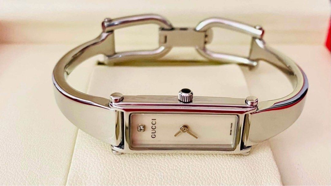 G.U.C.C.I Bangle 1500L Watch (Category: Women's Watches) located in Manila. Submitted by annafinds (Listing ID 1464065817, Image 1). Description: ₱13,500 Auth G.U.C.C.I Bangle 1500L Watch for Ladie’s -MOP Dial -Sapphire Glass -Swiss Made -Stainless Steel -Quartz Movement -For Medium Wrist Size -6.5” wrist -With Provided Box -In Excellent Condition 📌Disclaimer:📌 I Claim to be a Legit Watch Reseller. All Products, Names, Brands, and Logos are own