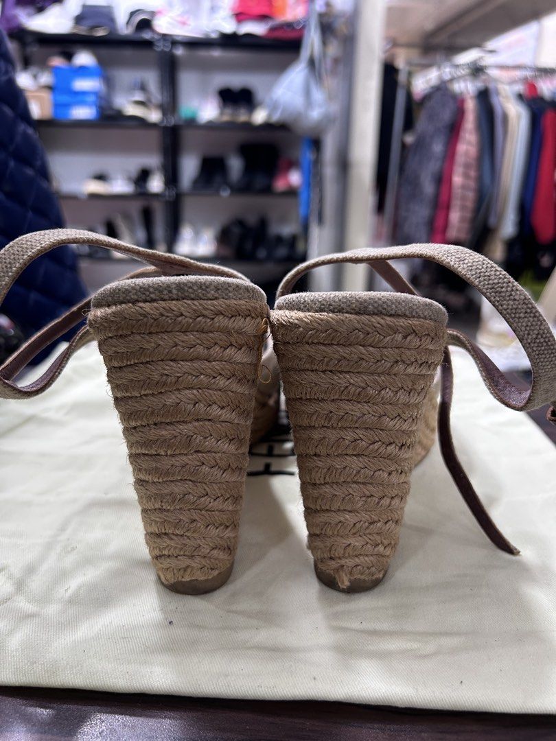 Gucci Espadrille Wedge Sandals (Category: Wedges) located in Pasig City. Submitted by blitzkriegspc (Listing ID 1464136805, Image 3). Description: - Authentic Gucci espadrille wedges - Crafted with durable canvas and leather straps - Chic rope wedge heel for added height - Secure ankle strap with buckle closure - Versatile style perfect for any occasion - Note: Shows some signs of wear on the insole.
