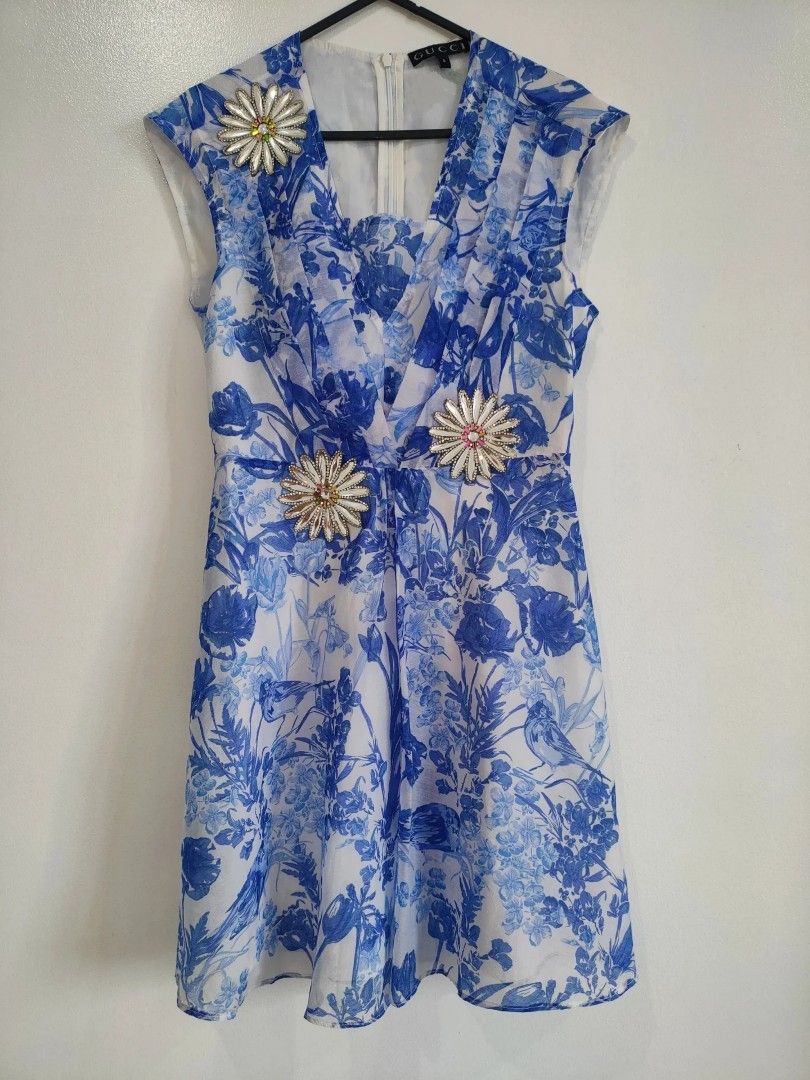 Gucci Floral Dress (Category: Dresses) located in Quezon City. Submitted by maxsab (Listing ID 1464043080, Image 1). Description: - Blue and white floral pattern with silver applique - Back zipper - Above the knee length.